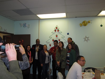 Ms. Lolita, Dolores, and Pete posing with the people from Stronghold Engineering